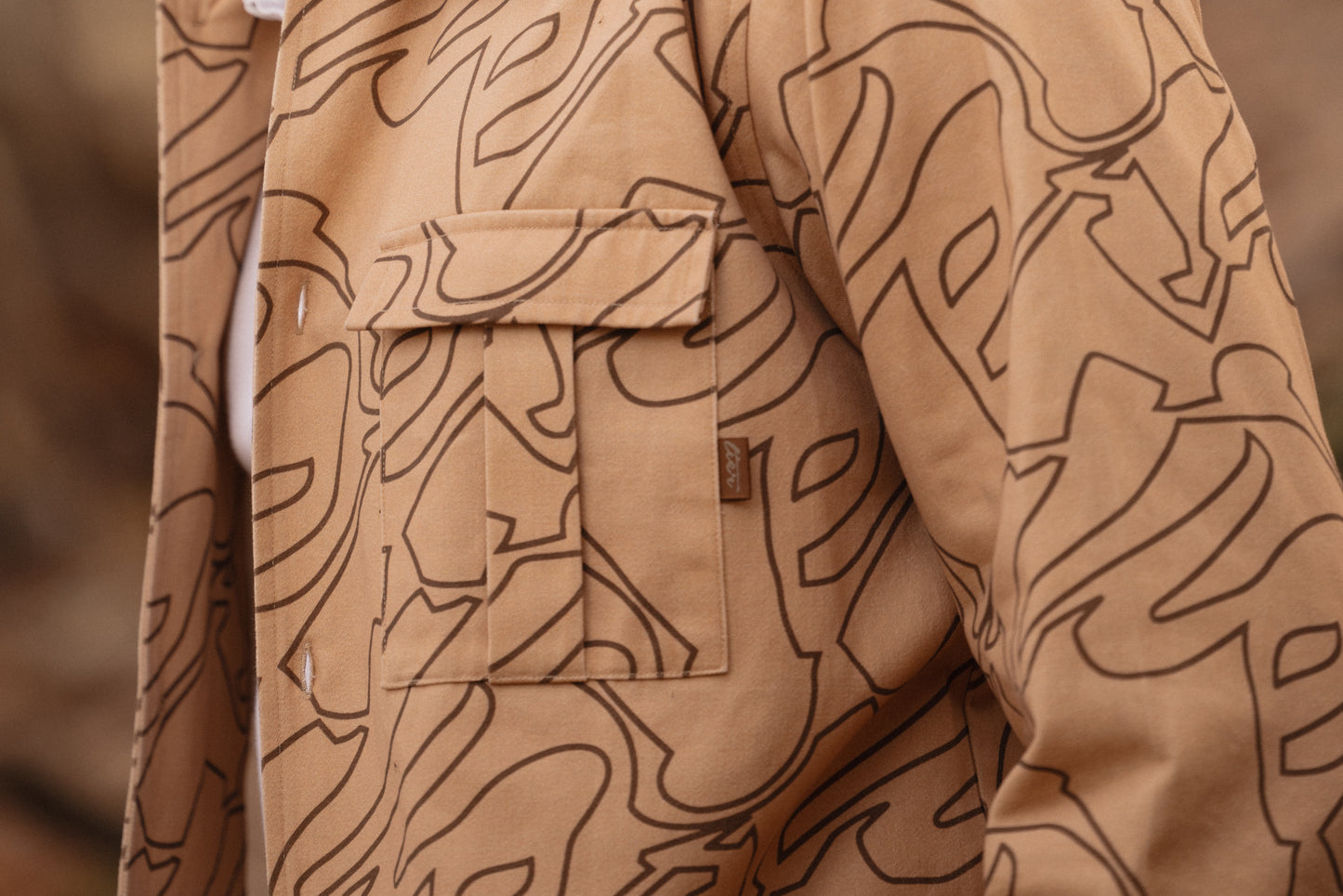 TOPOGRAPHIC BUTTON UP