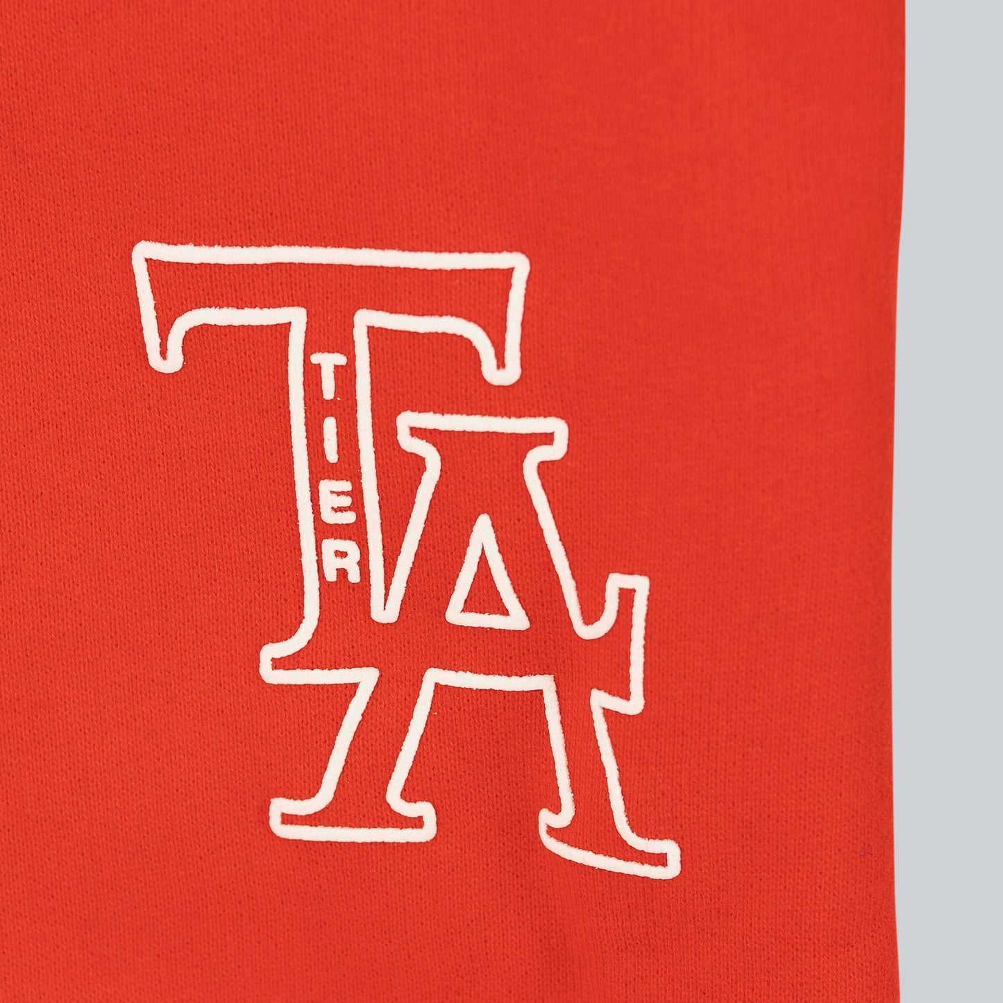RED TLA SWEATPANTS