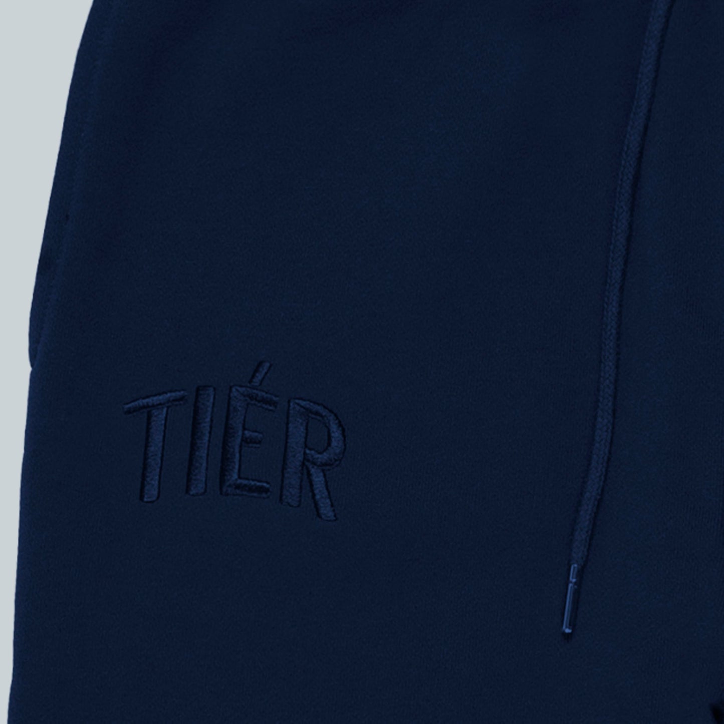 NAVY TIÉR SWEATPANTS